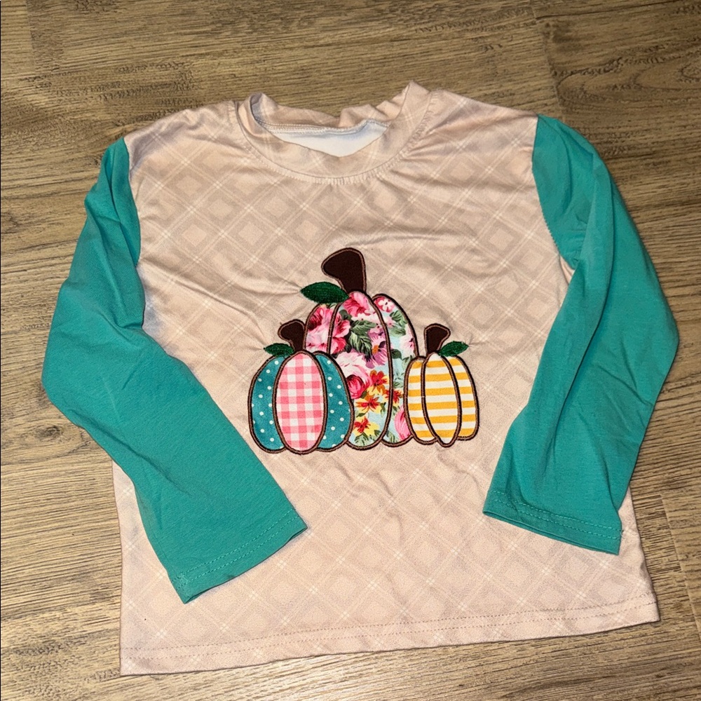 Pumpkin appliqué top